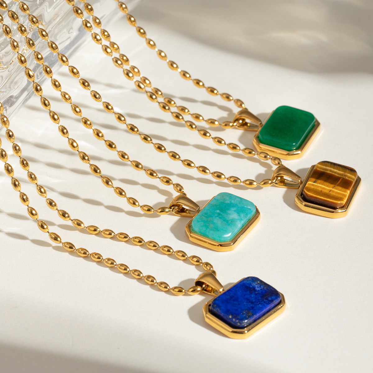 Wanxing estilo europeo y americano 18k oro de acero inoxidable collar de piedra de ojo de tigre universal mujer lujo ligero nicho alto sentido de joyería transfronteriza