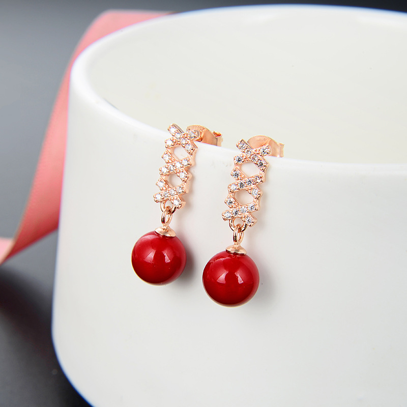 Aretes de perla roja para mujeres 925 plata esterlina nicho ligero lujo de alto nivel 2025 nuevos auriculares de Año Nuevo