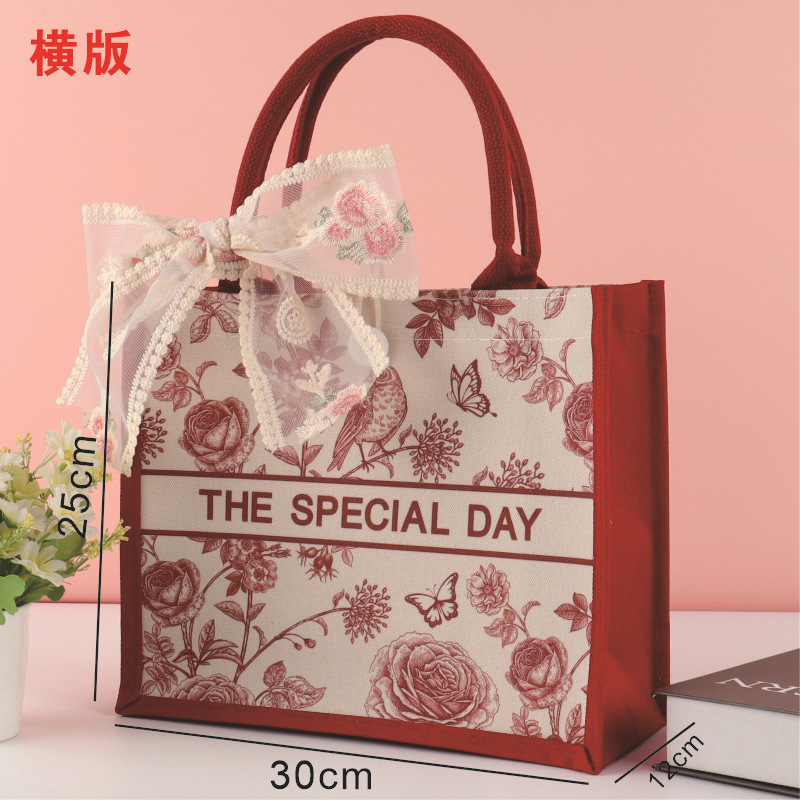 カスタマイズされた赤い高級お祝い誕生日宴会のお返しギフト付きキャンバスギフトバッグ Douyin 同じスタイルのショルダートートバッグ|undefined