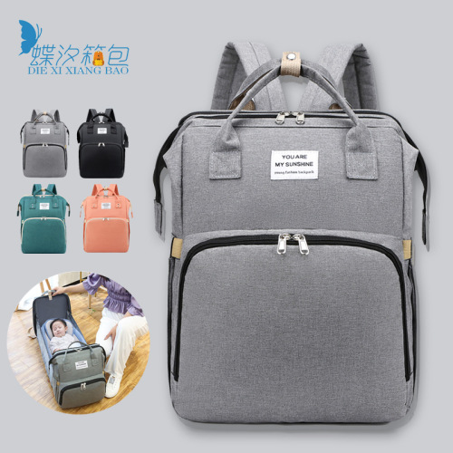 Factory wholesale mommy bag portable folding backpack mommy bag multifunctional hangable stroller crib mother and baby bag