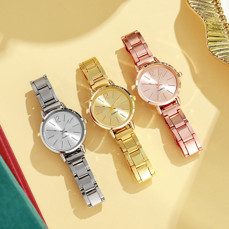 Nueva correa de acero de comercio exterior para mujer, moda simple, redonda, correa de acero pequeña de oro, reloj de cuarzo, reloj de moda para estudiantes de mujer