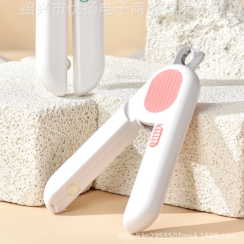 Transfronterizo Amazon mini limpieza de mascotas uñas cortaúñas gato perro cortaúñas LED línea de sangre