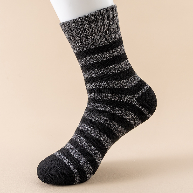 Calcetines de anillo para hombres de otoño y invierno más terciopelo grueso calcetines de piso de color sólido paralelo calcetines de toalla al por mayor transfronterizos