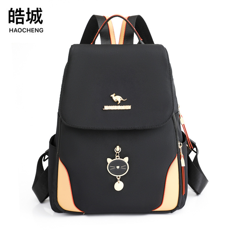 2023 primavera nueva versión coreana de la mochila de nailon para mujer moda linda color de contraste viaje mochila mochila escolar marea