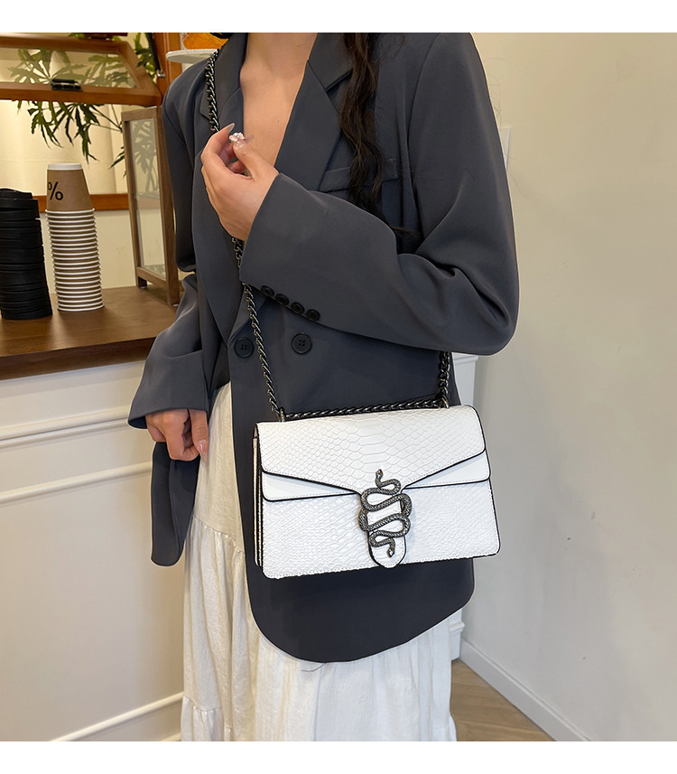 Women's PU Solid Color Snake Elegant Square Magnetic Buckle Crossbody Bag Square Bag Underarm Bag display picture 1