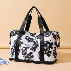 大容量手提短途旅行包女時尚輕便防水行李包男出差旅遊收納登機包