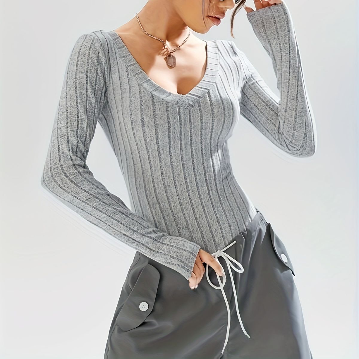Suministro transfronterizo de Amazon europeo y americano SLIM-Fit adelgazamiento de punto con cuello en V mono de piel top de las mujeres medias