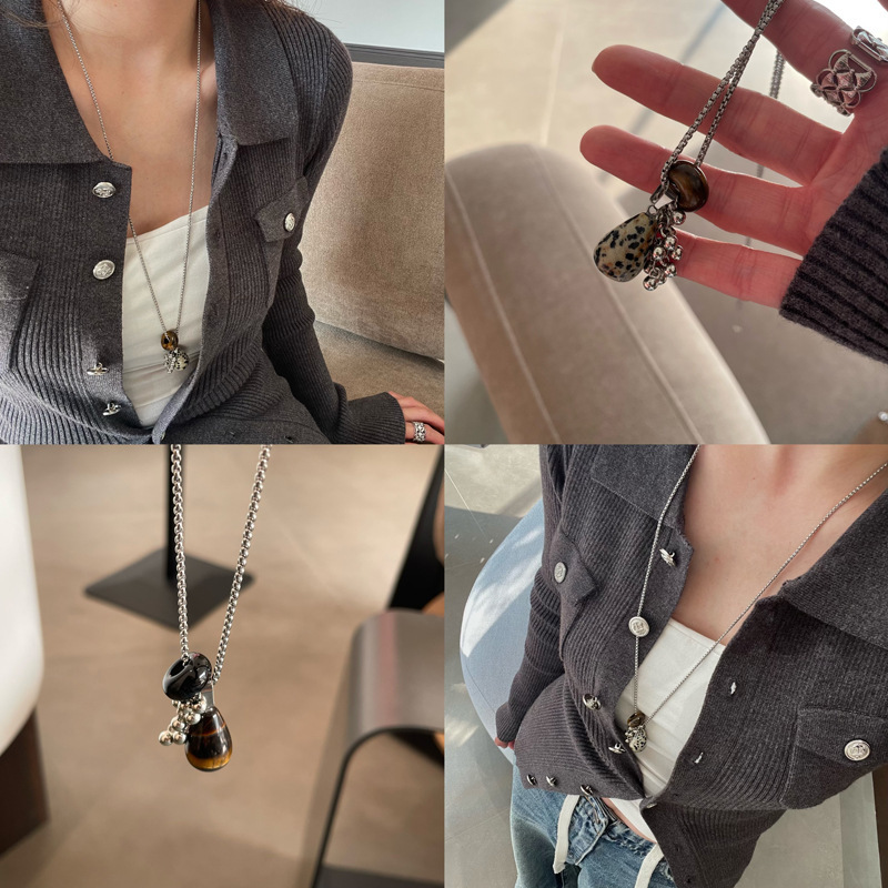 Collar colgante de gota de agua de piedra de punto de ojo de tigre, cadena de clavícula de todo fósforo de nicho retro, cadena de suéter de sentido avanzado, collar femenino