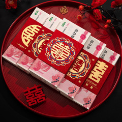 Engagement gift money in ten thousand yuan, tied with red ribbons and lucky character seals, money envelopes, wedding celebration supplies, red envelopes.