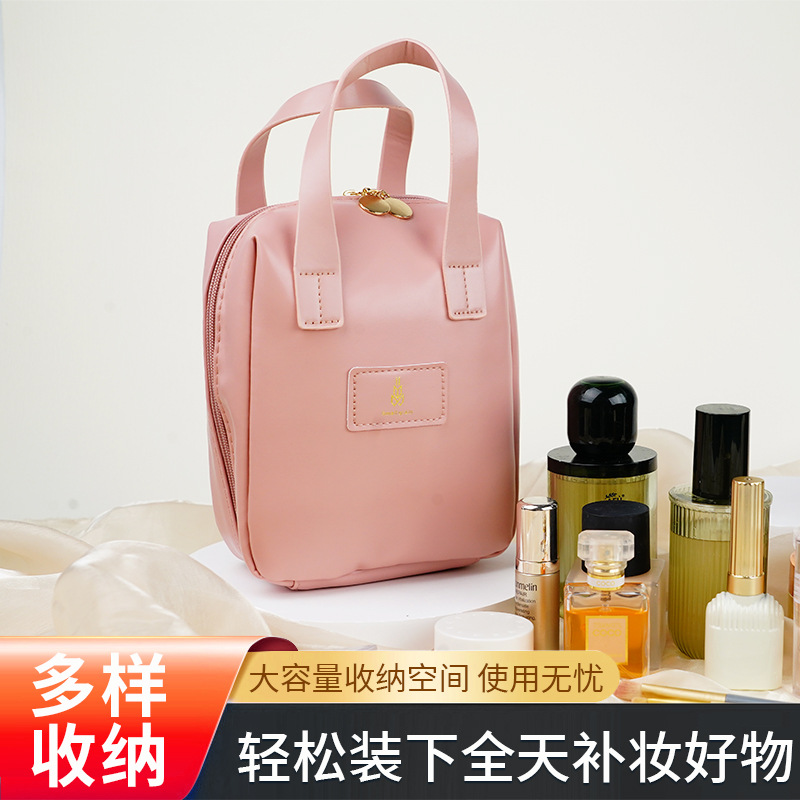 Bolsa de cosméticos nueva de 2024 con gran atractivo estético, gran capacidad, bolsa de almacenamiento portátil para viajes, bolsa de aseo impermeable.