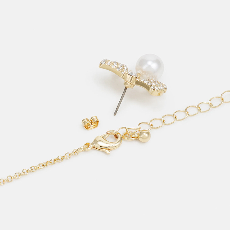 Moda nuevo arco conjunto de joyería de alta calidad collar de diamante de nicho pernos de orejas conjunto de joyería para mujeres