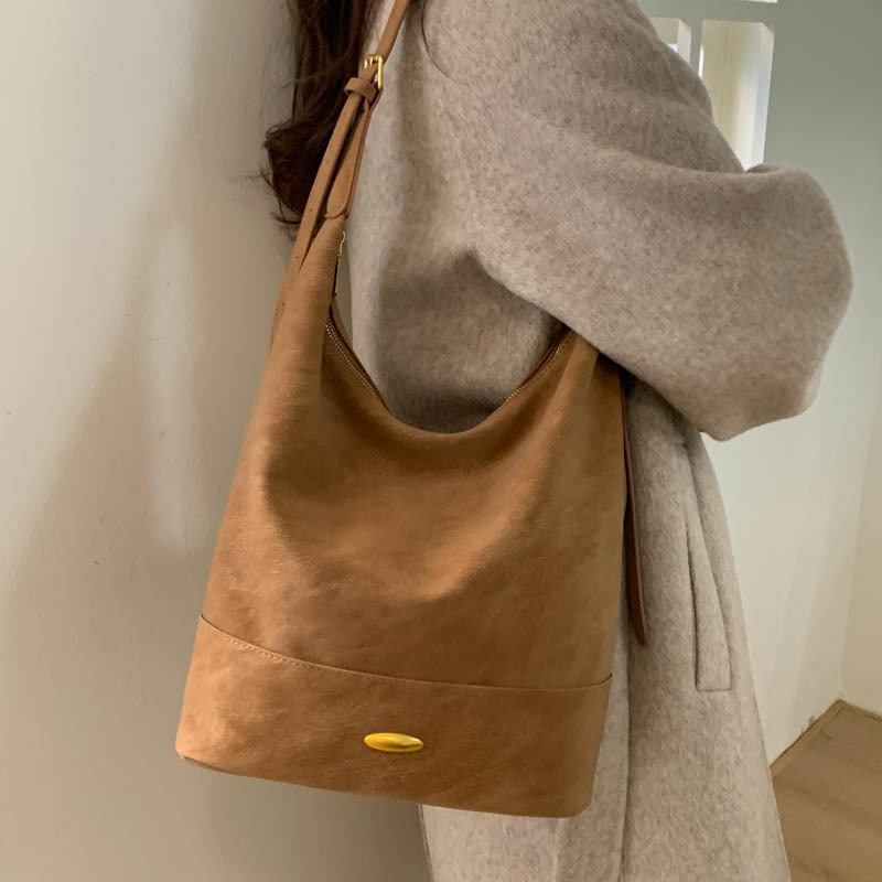 Coreano relajado sensación de colapsar bolso de cubo de seda bolso de mujer 2025 nuevo retro bolso de hombro bolso de viaje