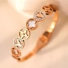 Wide version of four-leaf clover hollowed-out rose gold