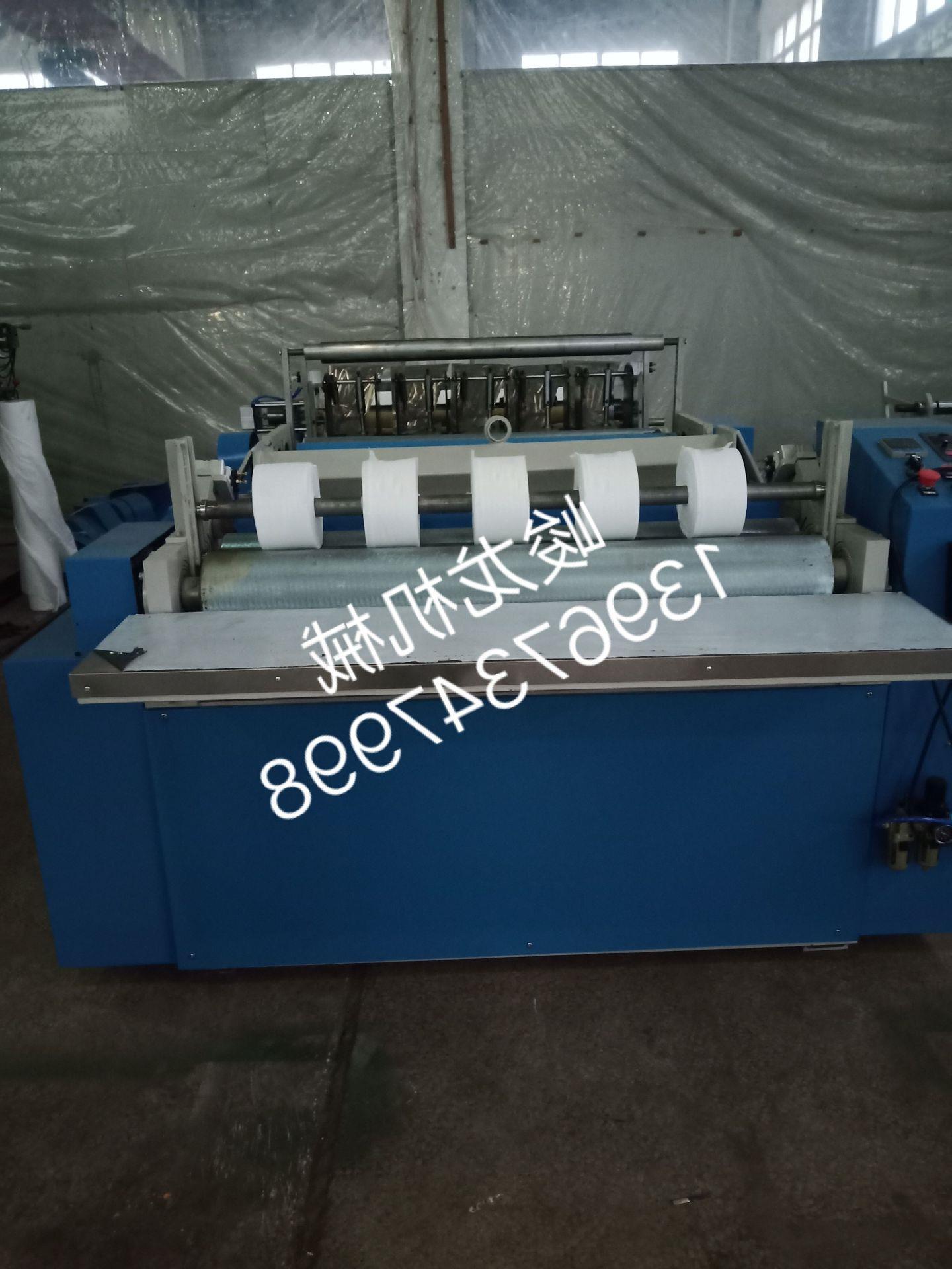 峻龙一次性洁面生产设备--无纺布柔巾机--点段无纺布美容巾设备