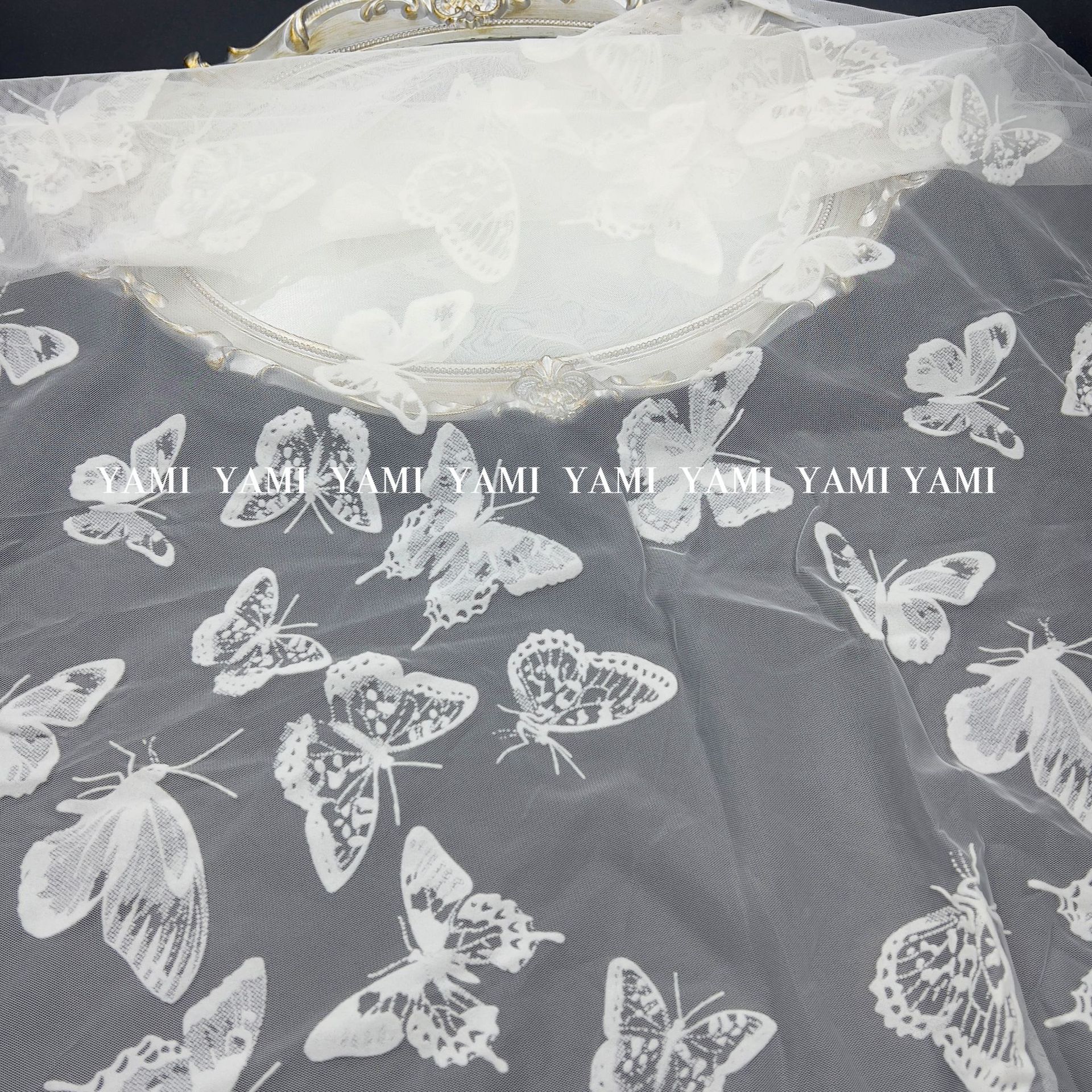 Tejido de malla de mariposa flocado mariposa hueca flocado tela de encaje de malla ultraflexible ropa infantil vestido de princesa tela de ropa china