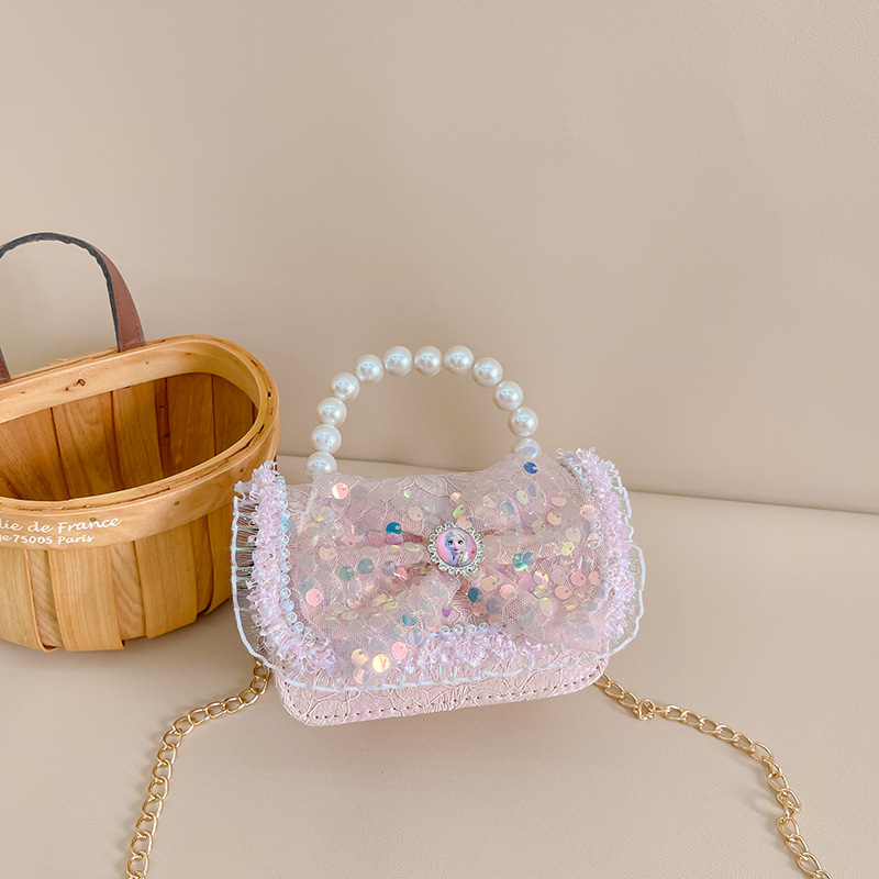 Primavera y verano nueva celebridad en línea bolso de los niños moda Chanel estilo princesa bolsa pequeña niña linda bolsa de mensajero portátil al por mayor