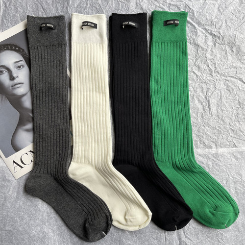 Trendy brand M woven label solid color double needle wide strip mid-length women's socks catwalk stockings pile socks