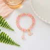 Peach colored bucket bead peach butterfly bracelet #SZ615