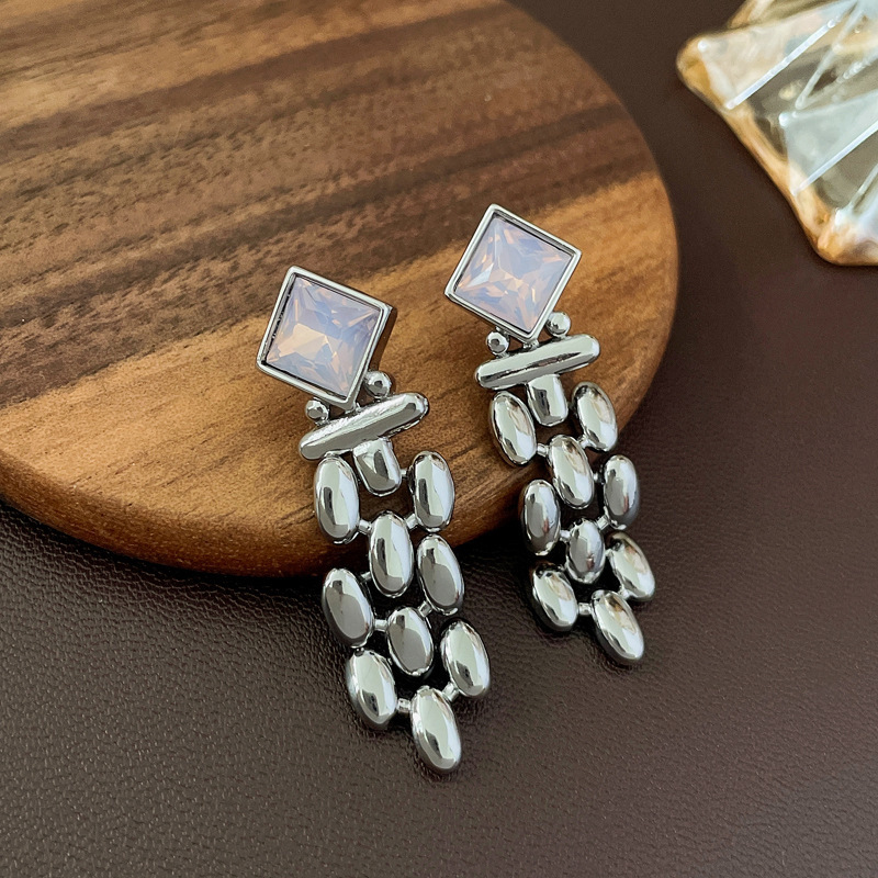 European and American chain earrings metal woven tassel fashion pendant earrings female s925 silver needle advanced gold plated ear jewelry