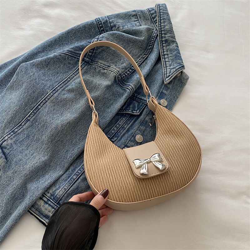 Bolsa debajo de la axila temperamento de alto valor facial bolso de mujer nicho de diseño bolso de hombro de invierno 2024 nuevo temperamento de arco mujer