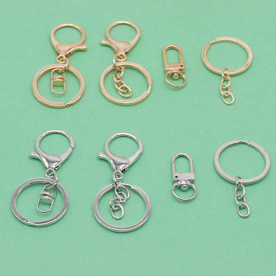 Fábrica al por mayor todo tipo de metal llavero accesorios de aleación langosta hebilla cadena hebilla 8-palabra llavero accesorios al por mayor