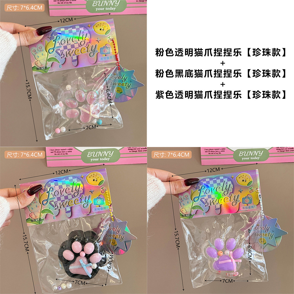 Pequeño libro rojo con el mismo estilo, grandes garras de gato perla, pellizcos, juguetes de descompresión, niña linda, artefacto de descompresión divertido al por mayor