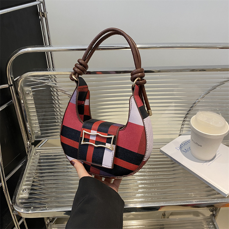 Temperamento simple y moderno 2024 casual Bolso de hombro con textura de estilo occidental popular de este año Bolso de axila con costuras de color en contraste