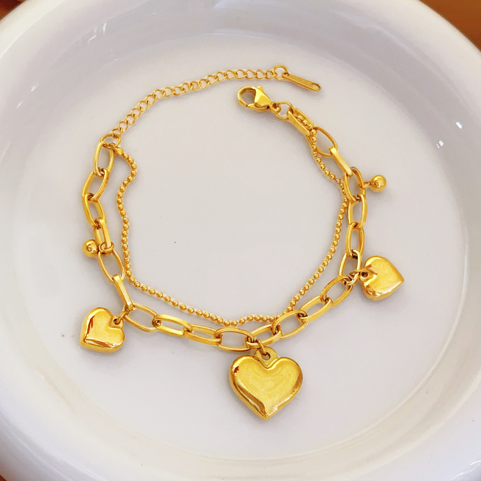 Colgante de corazón de melocotón de acero inoxidable transfronterizo europeo y americano Cadena irregular Pulsera de industria pesada chapada en oro Amor dorado Nuevo estilo
