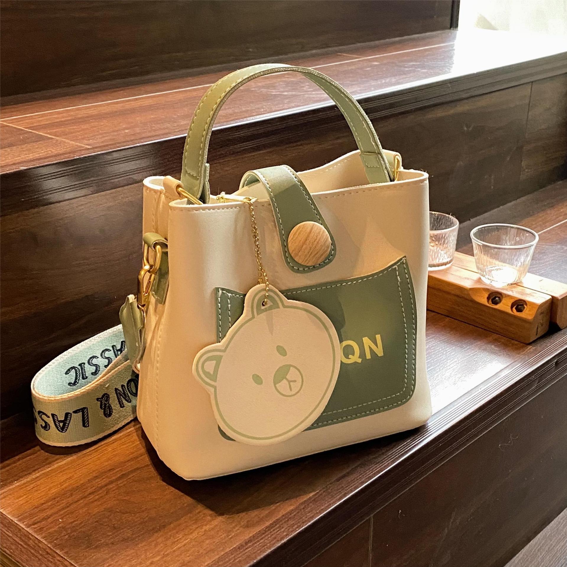 Diseño de nicho bolso a juego para mujeres 2023 nuevo popular bolsa de cubo bolsa de mensajero portátil de celebridades en línea de alta calidad