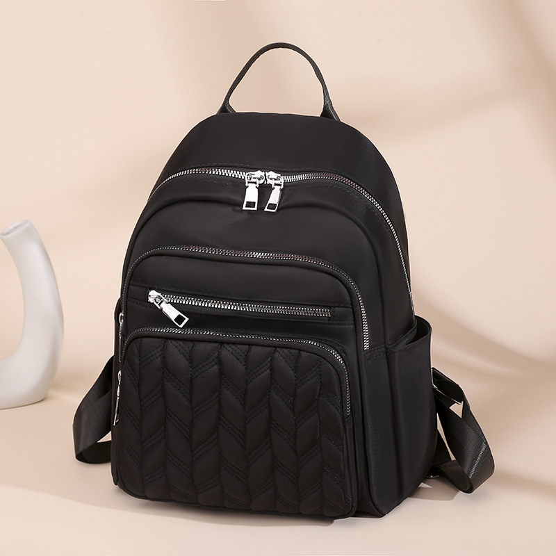 2025 nueva mochila de nylon impermeable transfronteriza mochila de damas de transporte urbano de gran capacidad de moda mochila de estudiantes