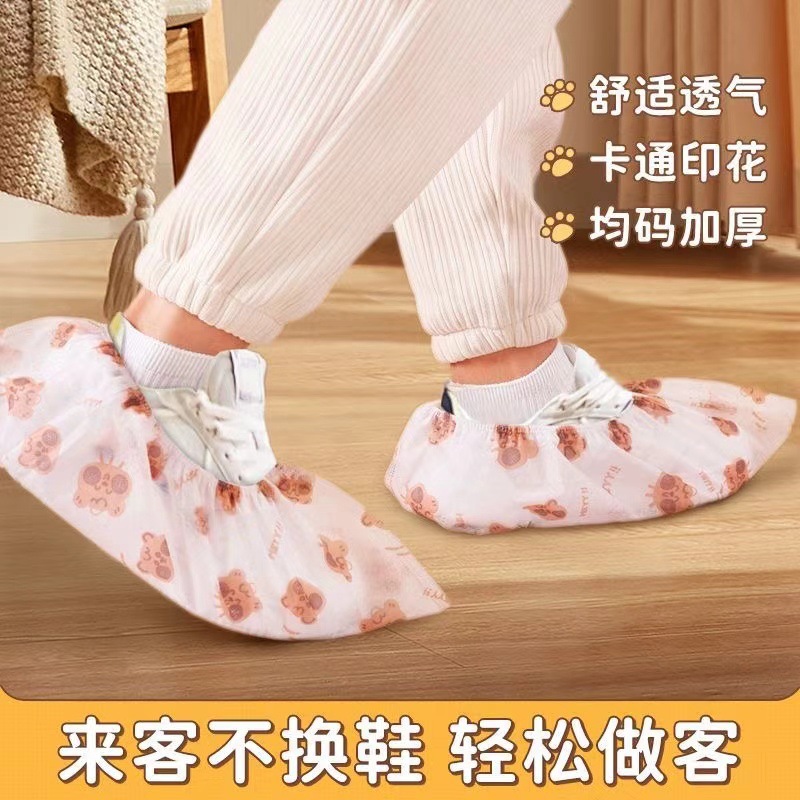 卡通无纺布鞋套家用一次性加厚防滑脚套室内耐磨耐脏成人印花鞋罩