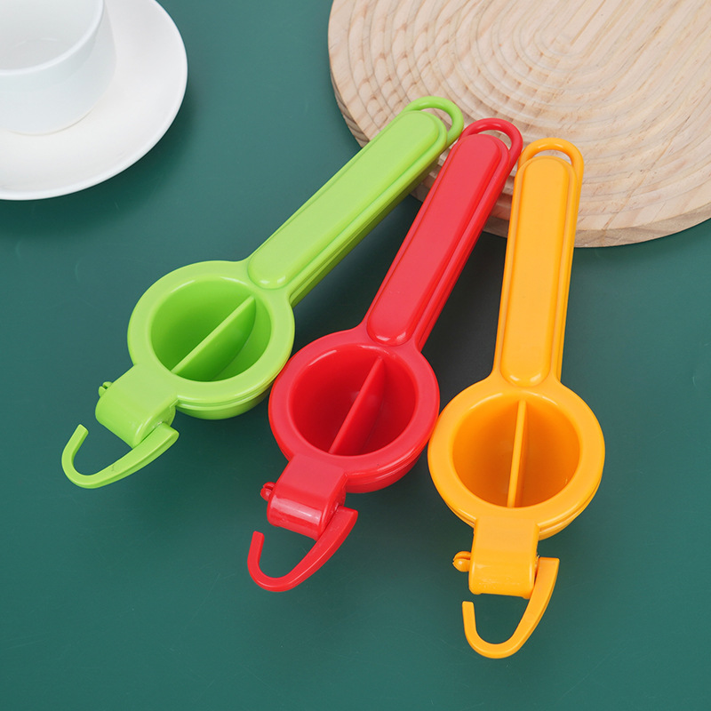 Exprimidor manual de frutas, con gancho, limón y frutas