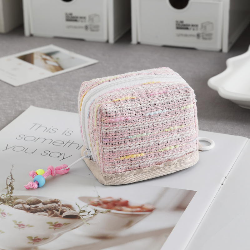 Nuevo mini bolso de llaves de viento de fragancia bolso de cambio lápiz labial de almacenamiento universal para el corazón de la niña conveniente para salir y almacenar en uno