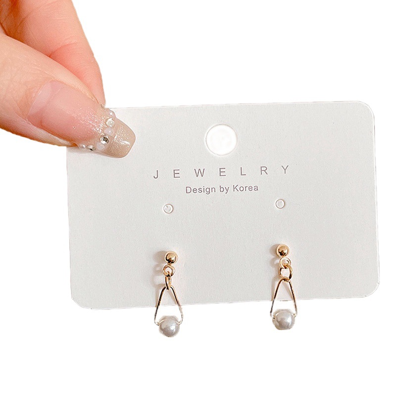 Pendientes de temperamento de alta gama, puestos callejeros en el mercado nocturno femenino, pendientes de todo fósforo de nicho, pendientes de moda en vivo de celebridades de Internet al por mayor