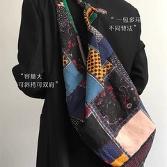 カラーの民族風は格子縞のショルダーバッグの大容量のキャンバスのリュックサックをつづり合わせて多くの個性の怠惰な風の斜めなショルダーバッグを使います。