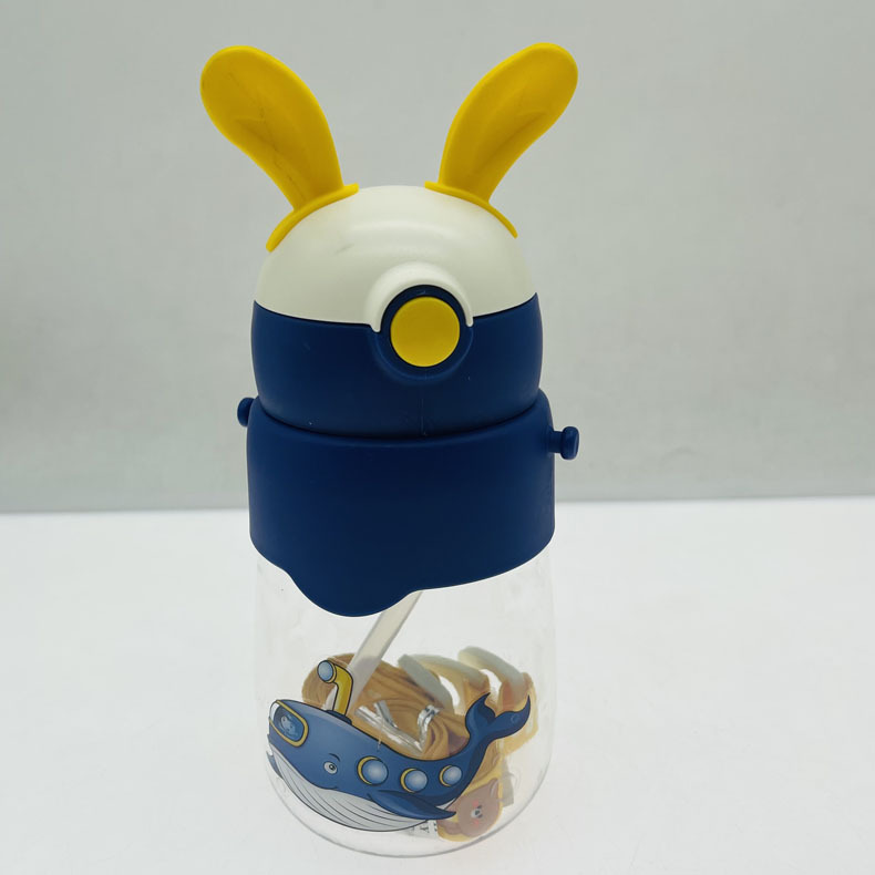Weilong 9012 espacio taza de agua de dibujos animados de impresión de plástico niños Orejas de conejo de aprendizaje taza de beber con mango taza de paja