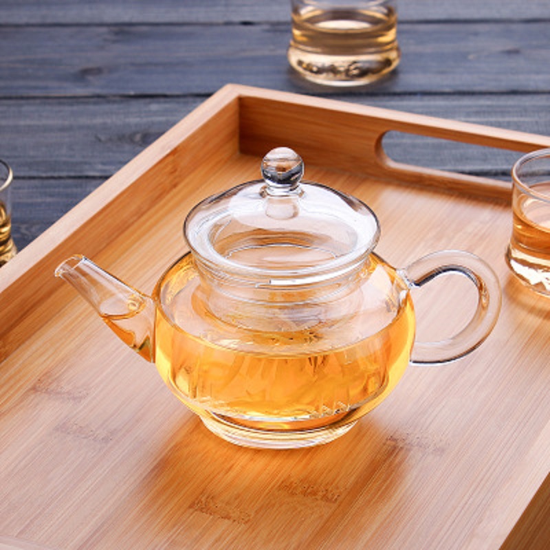 Fábrica al por mayor olla de seis personas con Gall hecho a mano olla de vidrio resistente al calor Flor de vidrio y hierba tetera transparente mini tetera LOGO