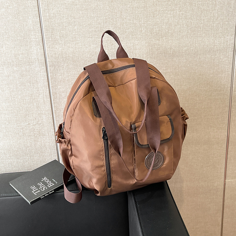 2024 otoño y invierno nuevo estilo bien sensación de alta calidad compacta simple versátil gran capacidad viaje de negocios mochila de hombro