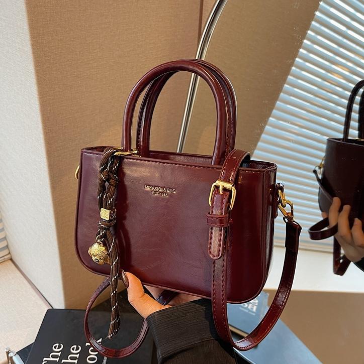 Transfronterizo simple bolso de mano ocio para mujeres 2025 nuevo bolso de hombro de moda retro popular bolso de mochila versátil