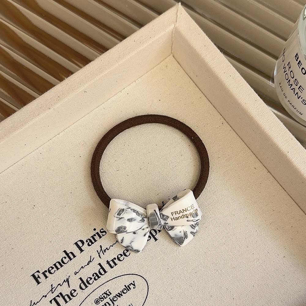 Coreano oro acético adorable arco de cabello anillo de cabello cuerda elástica cuerda de cabello duradera mujer