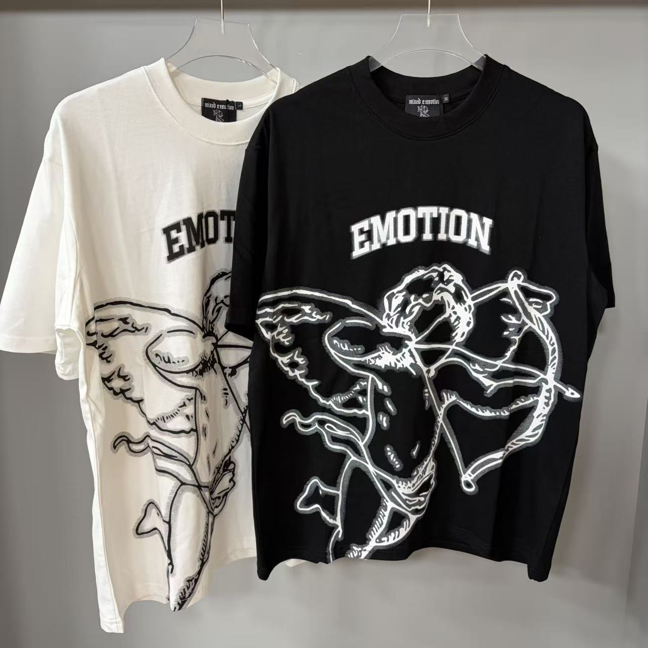 Transfronterizos MIXED EMOTION Ángel Impresión extraterrestre camiseta de hombre y mujer callejera de diamante de cuello redondo de manga corta