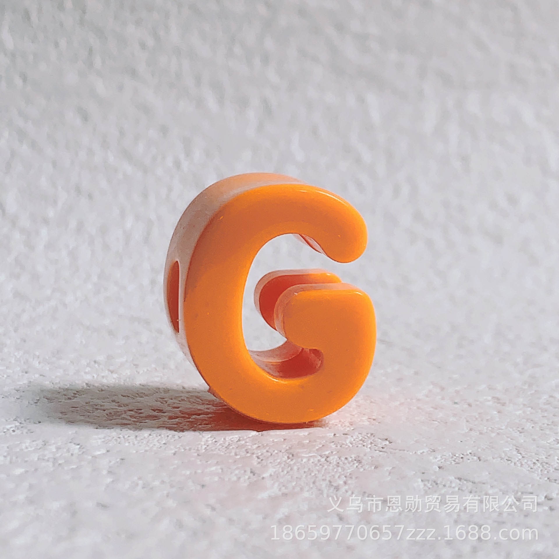 G (Orange)