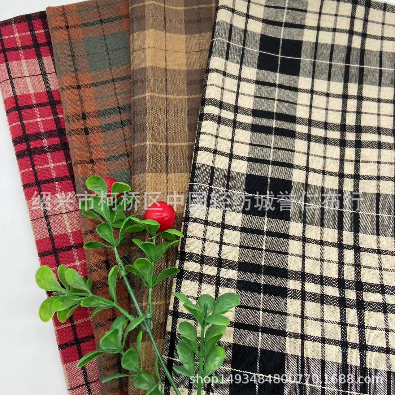 春夏新款薄款色织布全棉衬衫格子布休闲校服几何提花面料现货批发