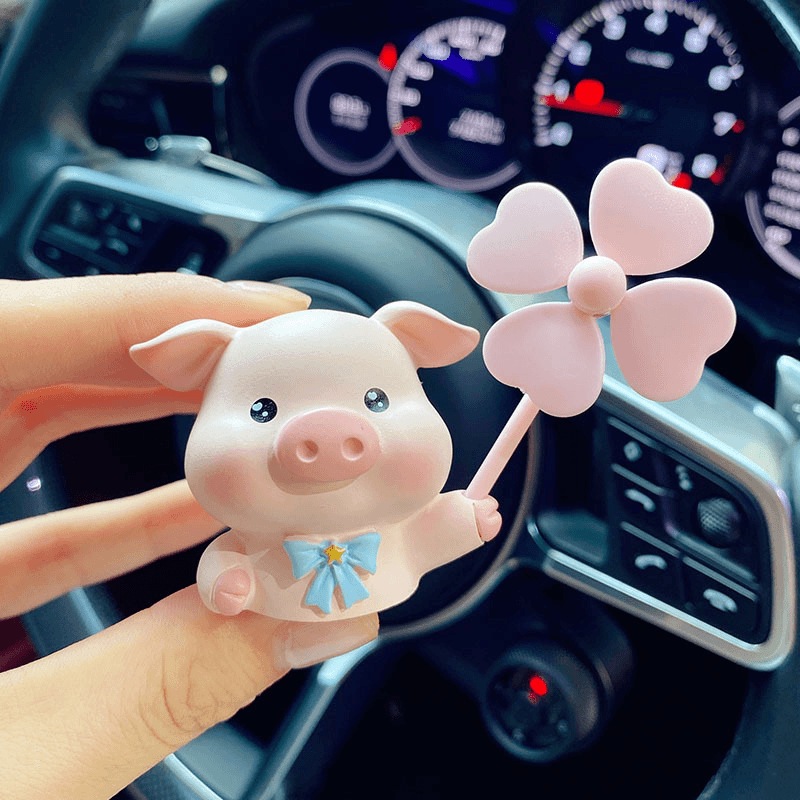 Aire acondicionado del automóvil salidas de aire decoraciones aromáticas dibujos animados lindo cerdo coche eléctrico consola adornos de perfume montados en el automóvil