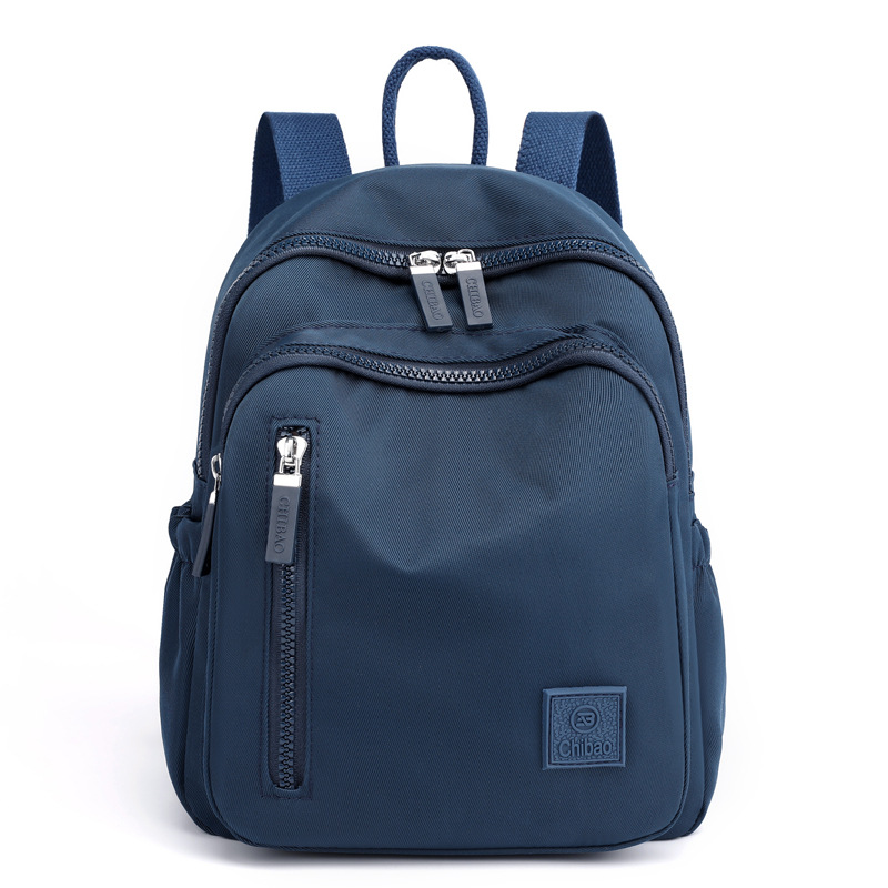 Mochila sencilla e informal para mujer, bolso portátil de gran capacidad para viajes y desplazamientos, mochila versátil de tela de nailon de gran capacidad para mujer