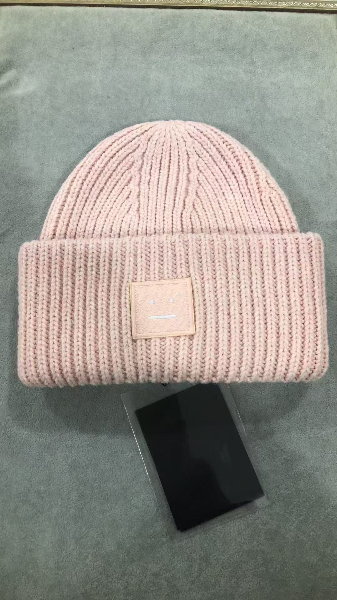 AC笑顔の帽子の四角のラベルを貼って、ウールの北欧風の冷たい帽子の韓国版のカップルの毛糸の帽子の高品質の冷たい帽子を巻きます。