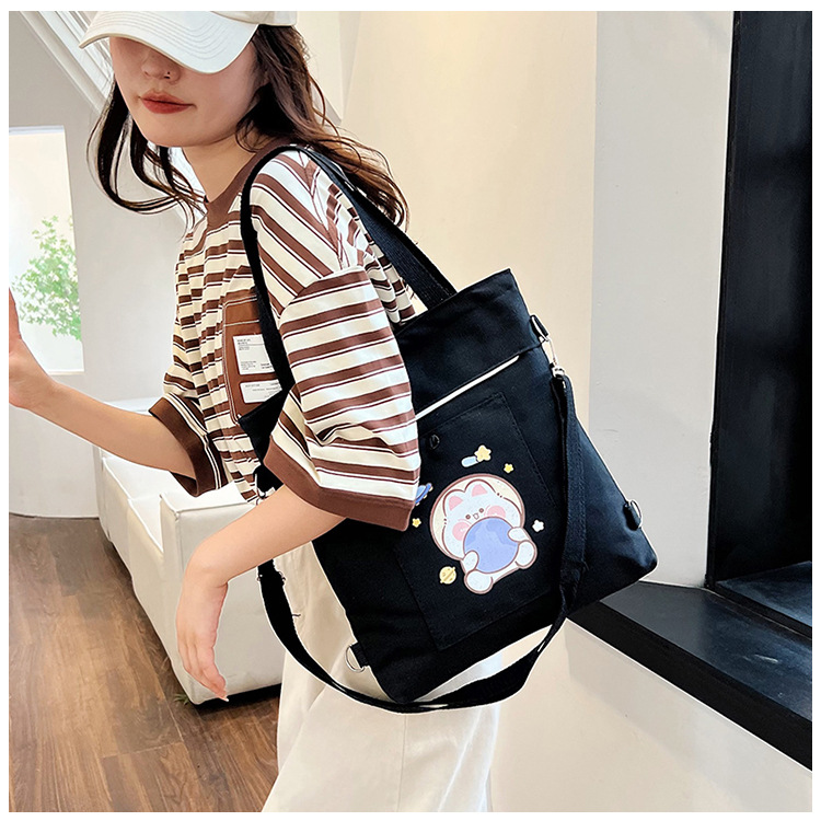 Wholesale of 2025 new cartoon casual canvas bags, large-capacity, fashionable and cute girl single-shoulder bags and tote crossbody bags undefined