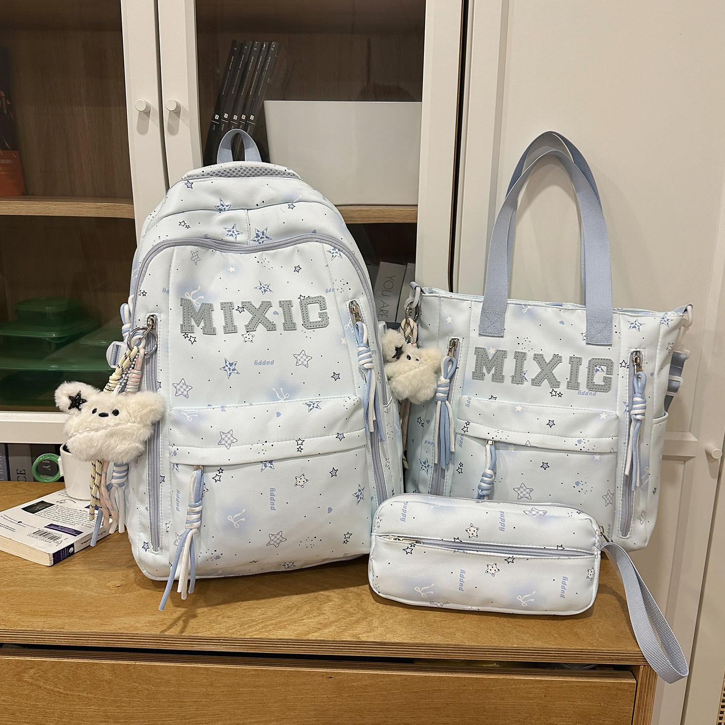 Blue three-piece set with 2 black star white fur rabbit ornaments