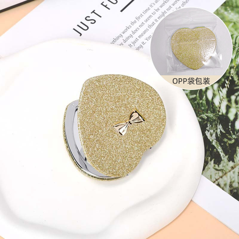 Espejo pequeño de amor de alto valor con mini dormitorio de estudiante espejo plegable de doble cara espejo de maquillaje portátil redondo