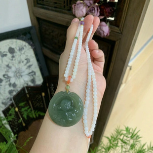 Hetian jade Maitreya Buddha, the lake is green, shiny and moist, rich in color, carved laughing Buddha, big ears and double drooping